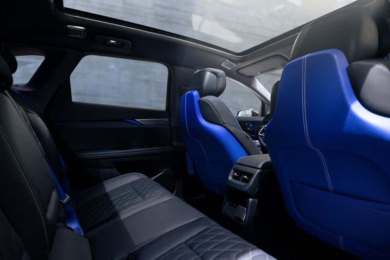 Back Seat View of the 2026 OPTIQ-V Blue Front Seats, Sun Roof, and Interior | Grand Island Cadillac in GRAND ISLAND NE