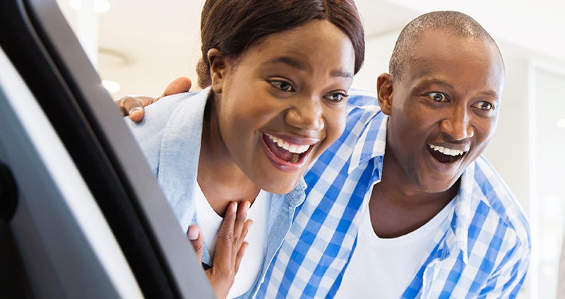 smiling couple Grand Island Cadillac in GRAND ISLAND NE